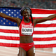 Tori Bowie of the United States celebrates after winning bronze in the Women’s 100 metres final during day three of the 15th IAAF World Athletics Championships Beijing 2015 at Beijing National Stadium on August 24, 2015 in Beijing, China.